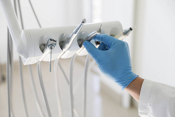 Professional Tooth Extraction technician working in North Liberty, IN